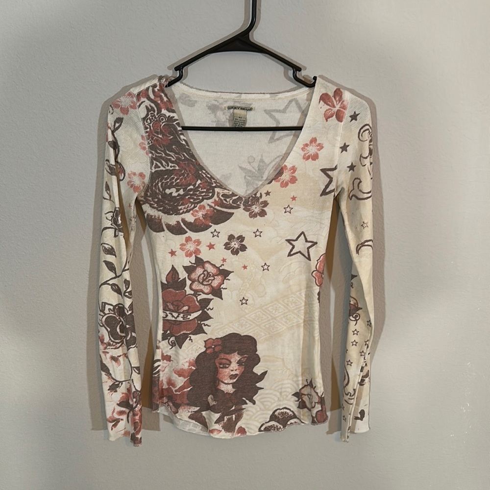 Woman’s lucky brand extra small, long sleeve shirt / top
